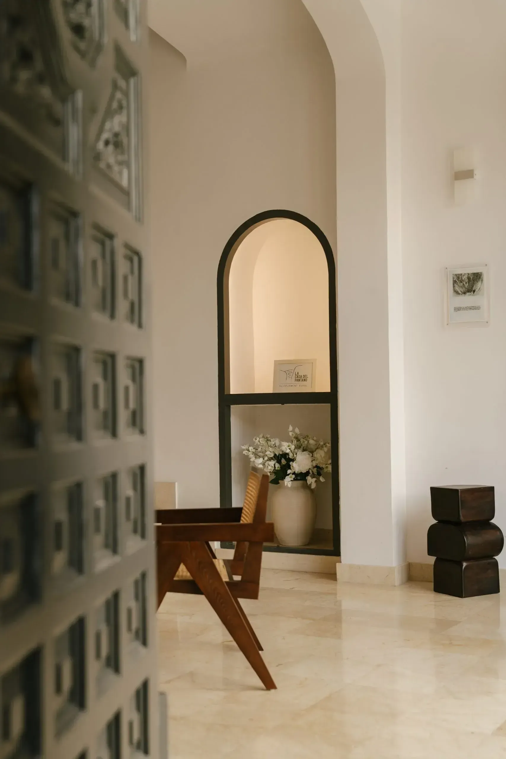 Arched interior corridor in warm plaster