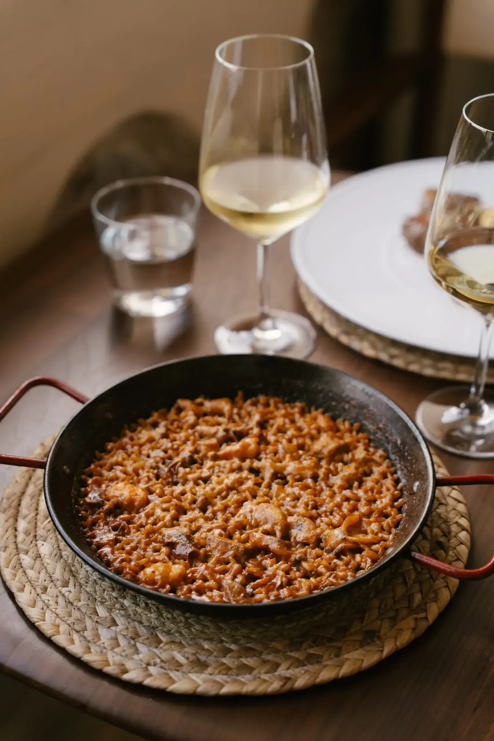 Paella and a glass of white wine