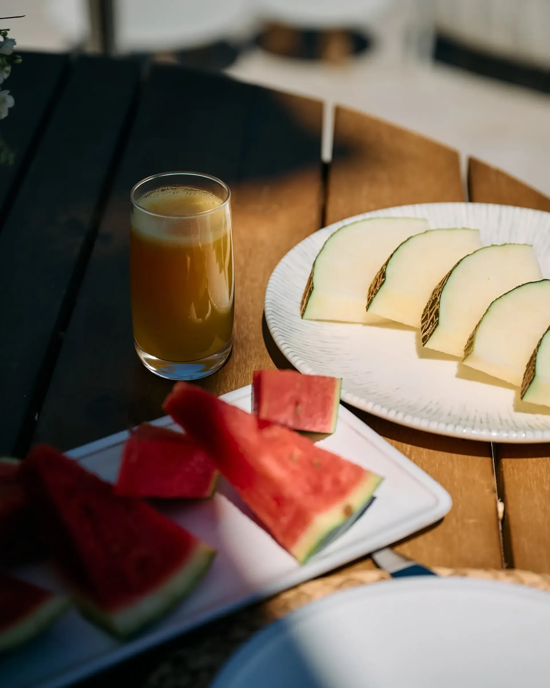 Melon, watermelon and fresh juice served on the terrace at Denia