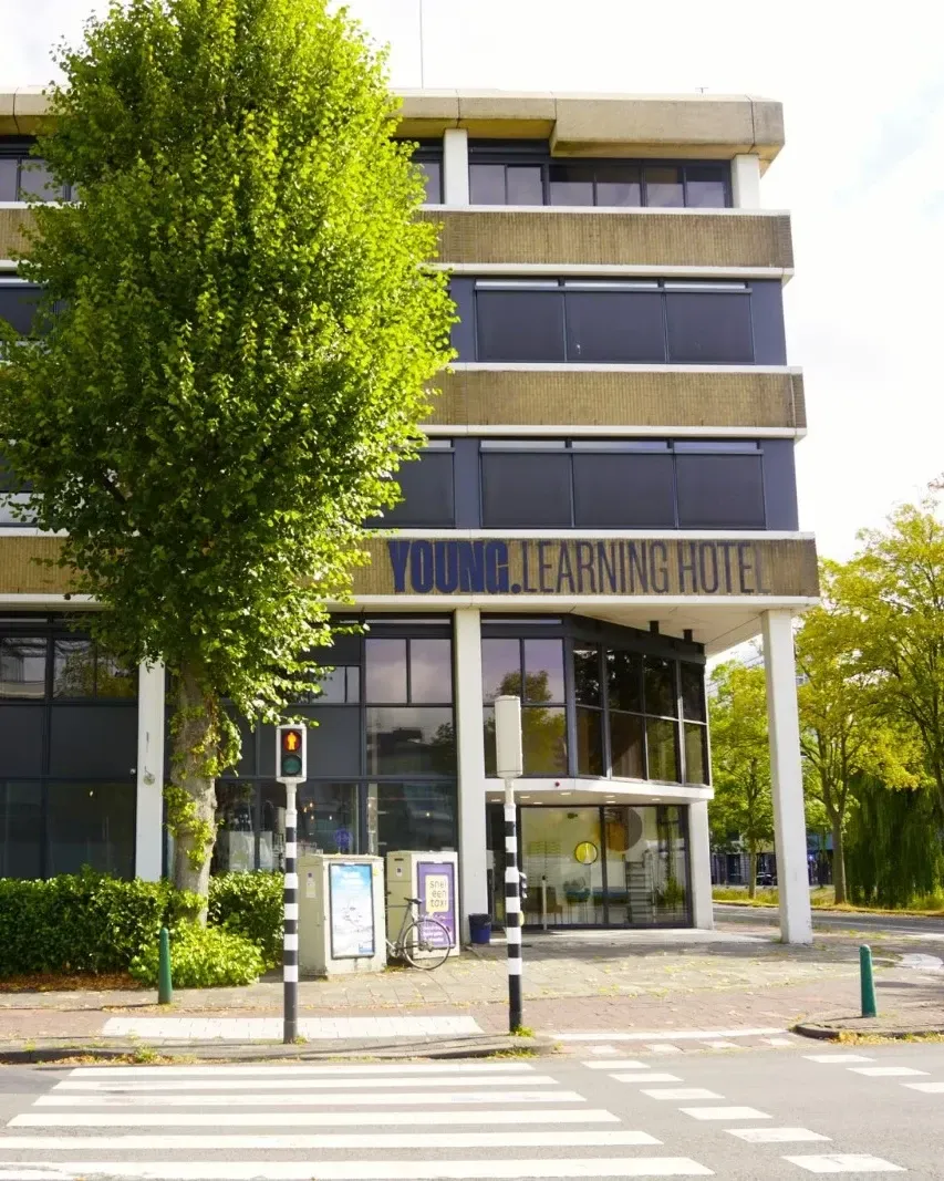 The entrance of YOUNG Learning Hotel seen from the street